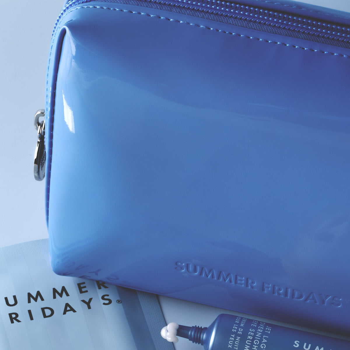 glossy-pouch-in-jet-lag-blue-x5 Glossy-Pouch-Jet-Lag.jpg