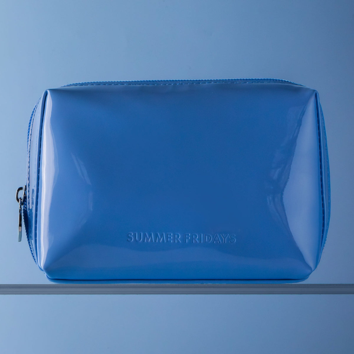 glossy-pouch-in-jet-lag-blue-x5 Glossy-Pouch-Jet-Lag-2.jpg